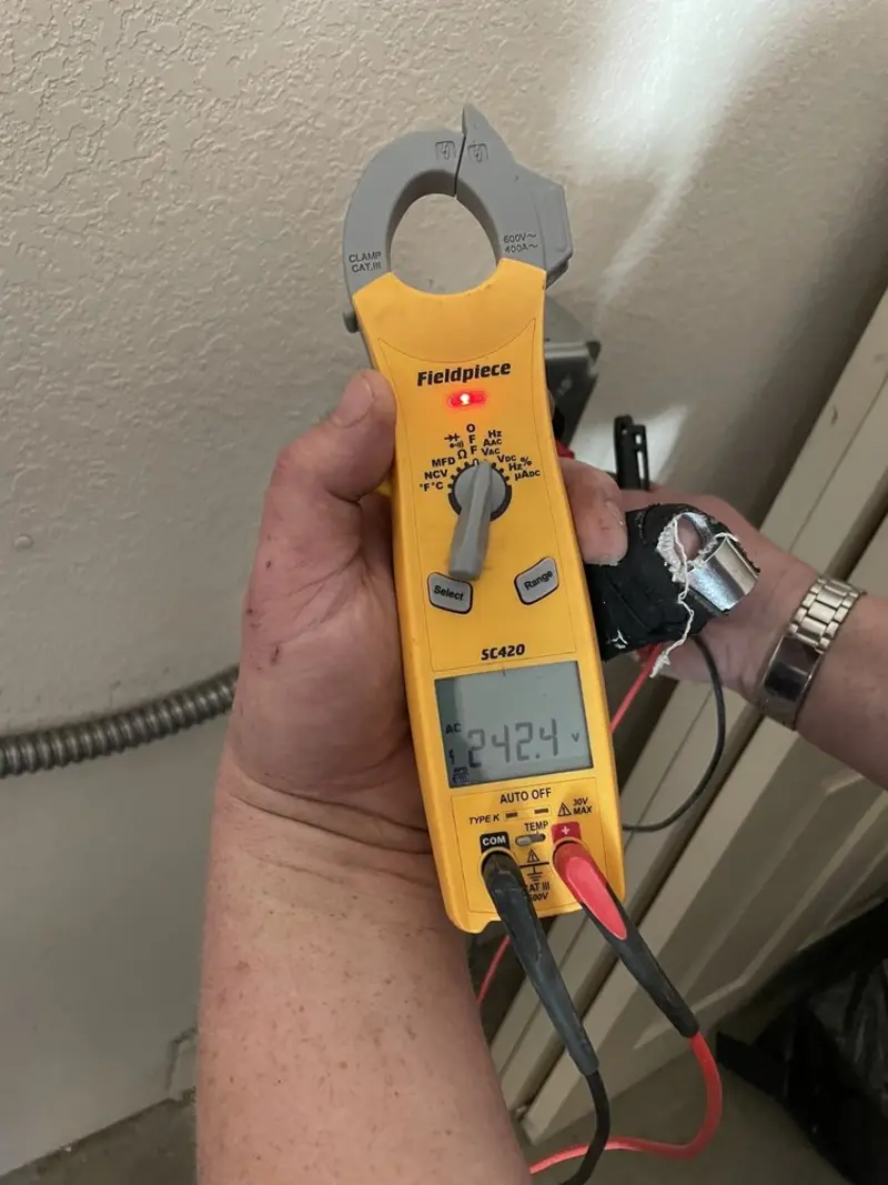 Voltage testing with clamp meter during Generator Installation in Tustin